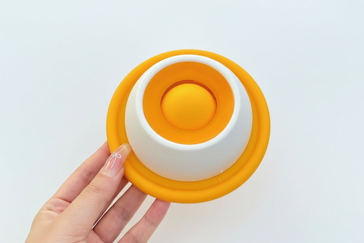 Juguete interactivo lamedor lento para perros y gatos.